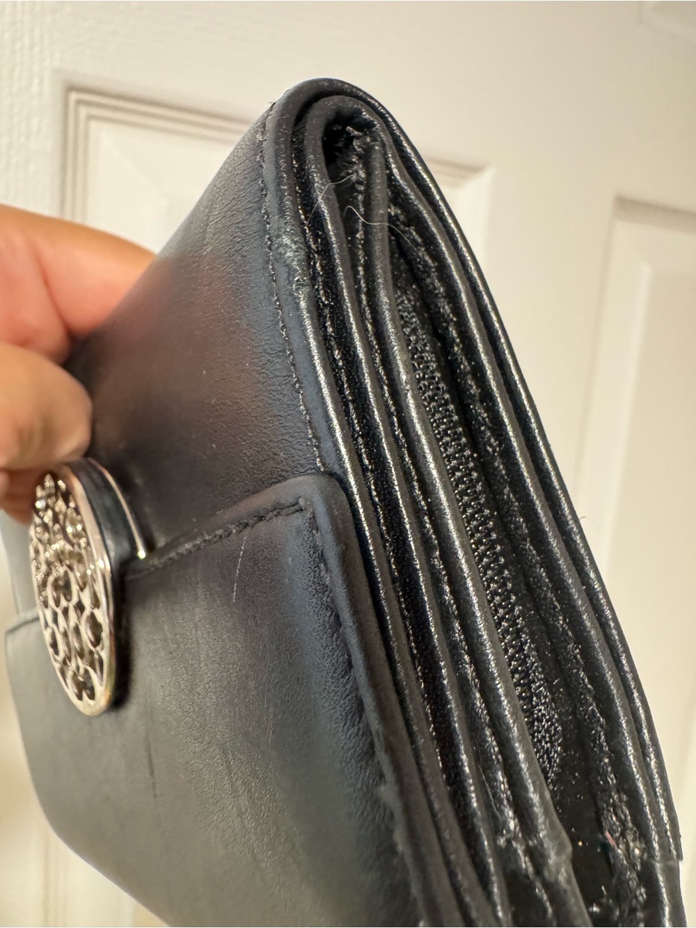 Classic Black Leather Wallet with Decorative Medallion - Picture 4 of 7